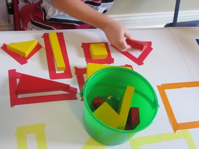 Exploring our shapes with blocks on the table top